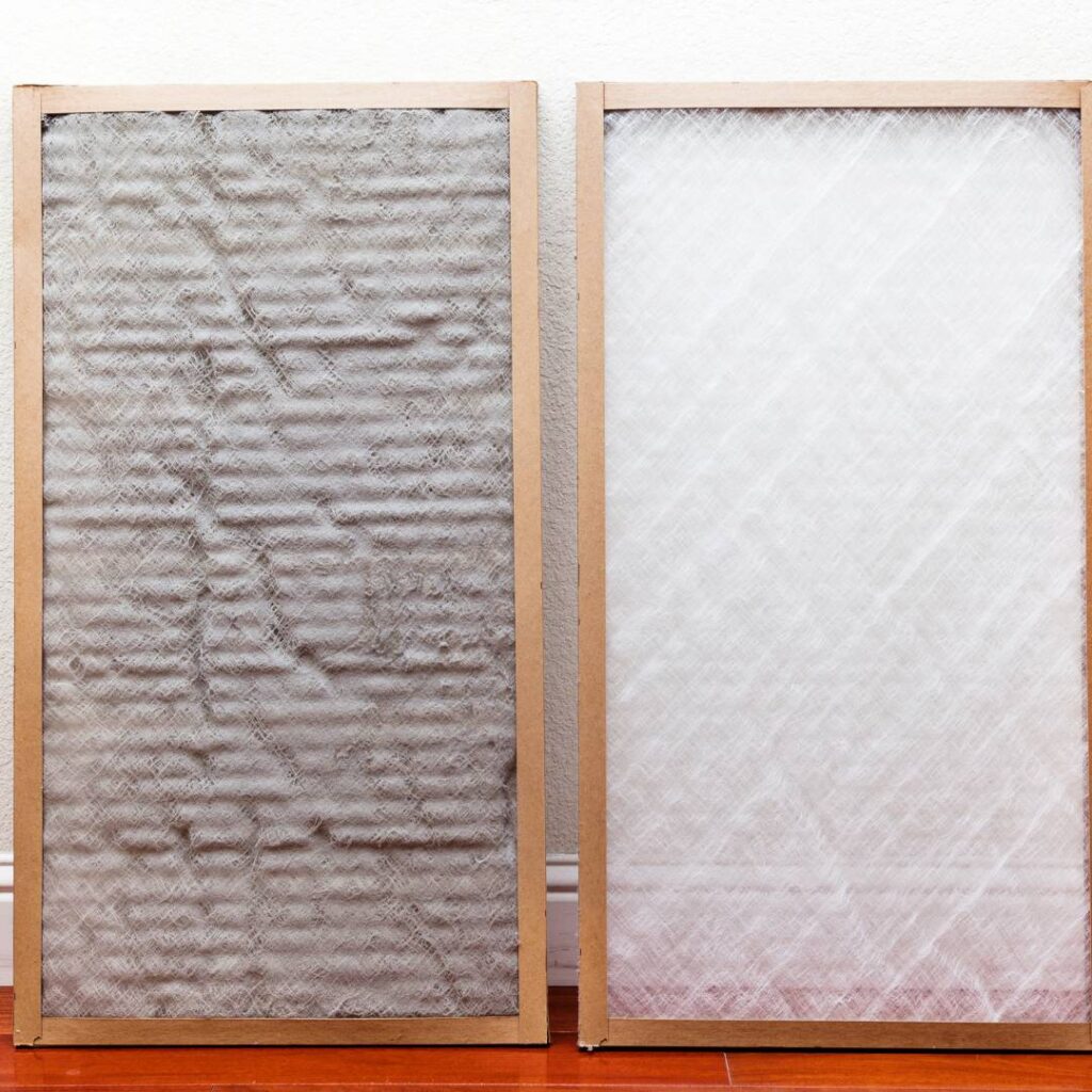 dirty furnace filter next to clean furnace filter