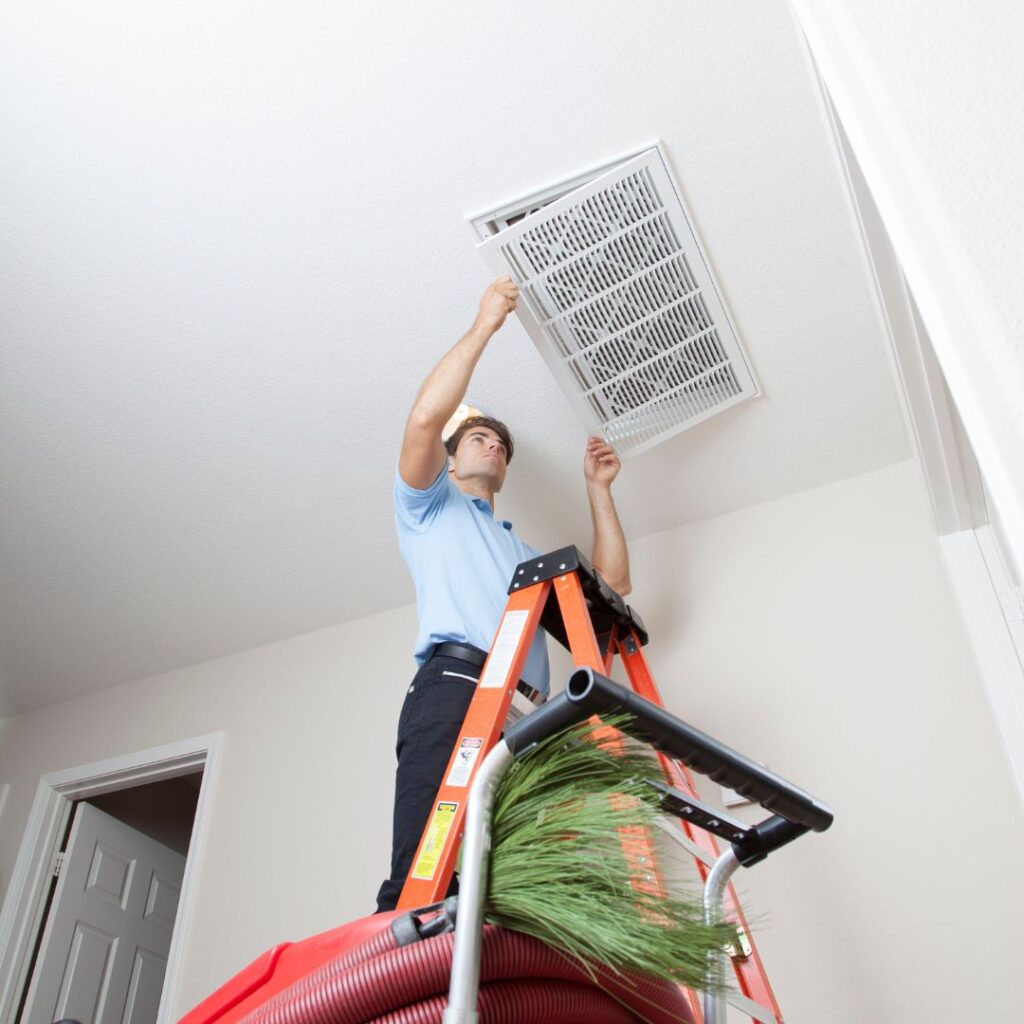 home service provider performing hvac air duct cleaning