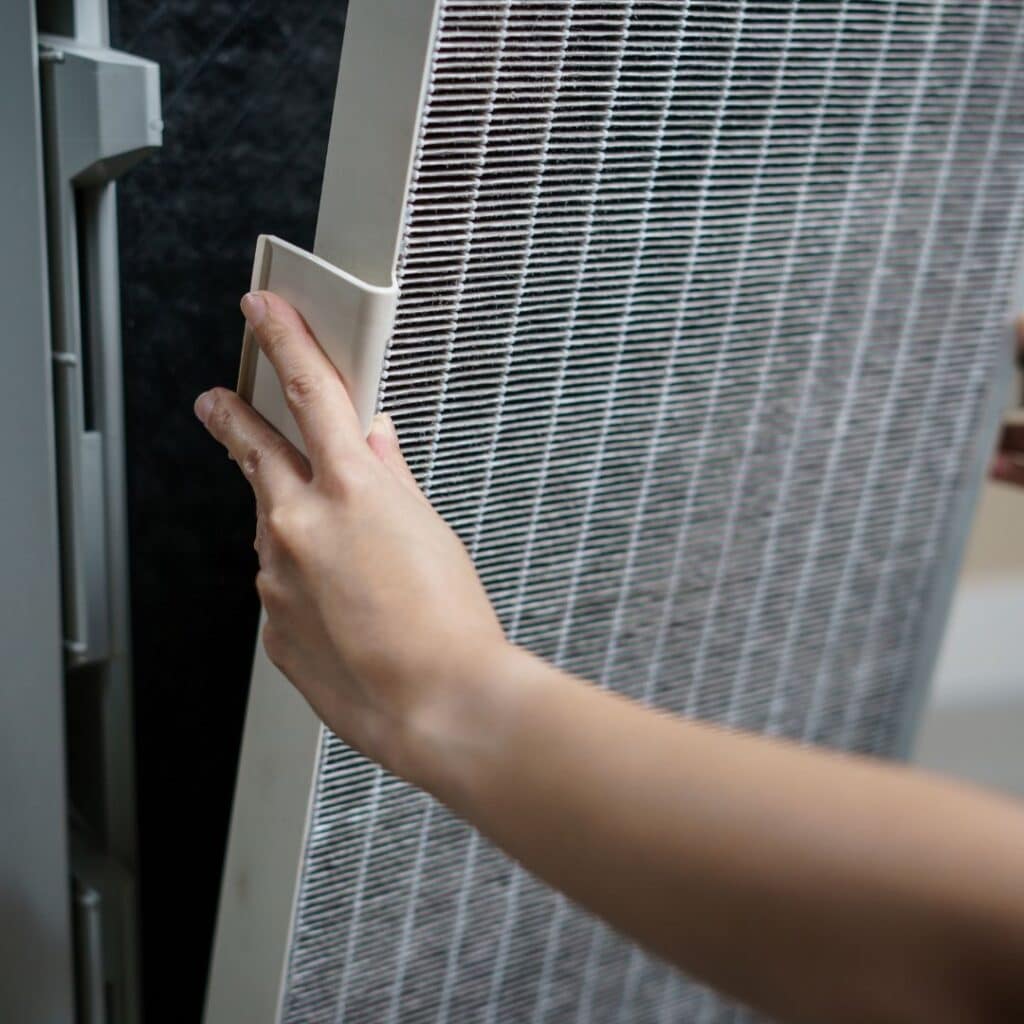 Changing hvac system filters to improve the indoor air quality in a home